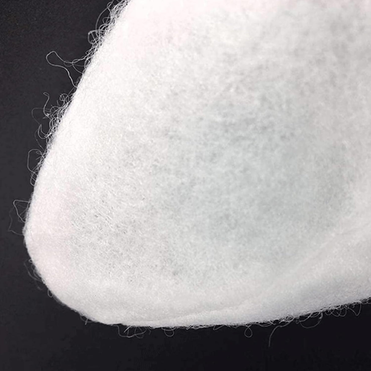 Filtro multistrato bianco per aspiratore Water Tech Poolblaster, primo piano su trama fine.