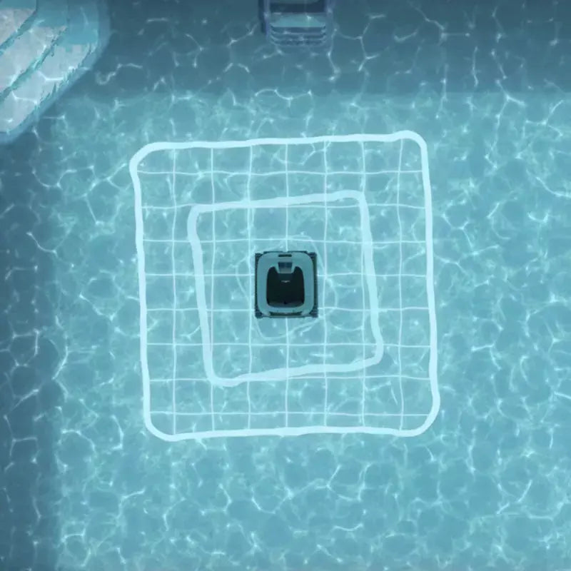 Robot piscina Dolphin Eon 100i cordless in azione sul fondo di una piscina con griglia di navigazione.