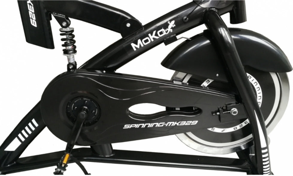 Spin Bike con Pignone Fisso Moko MK 329 - Volano Kg.15 - Trasmissione Cinghia - Ammortizzata - Display LCD